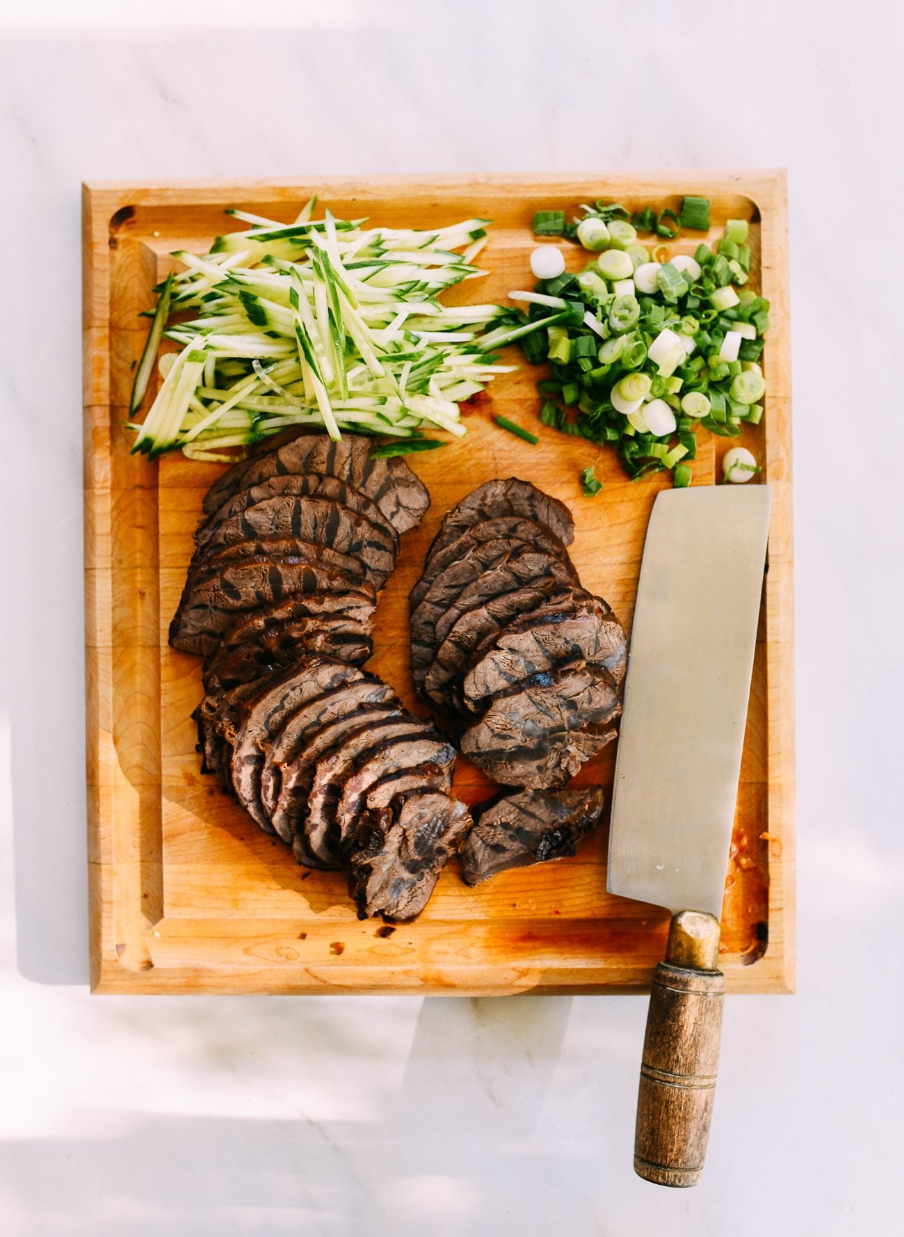 sliced beef shank, cucumber, scallion