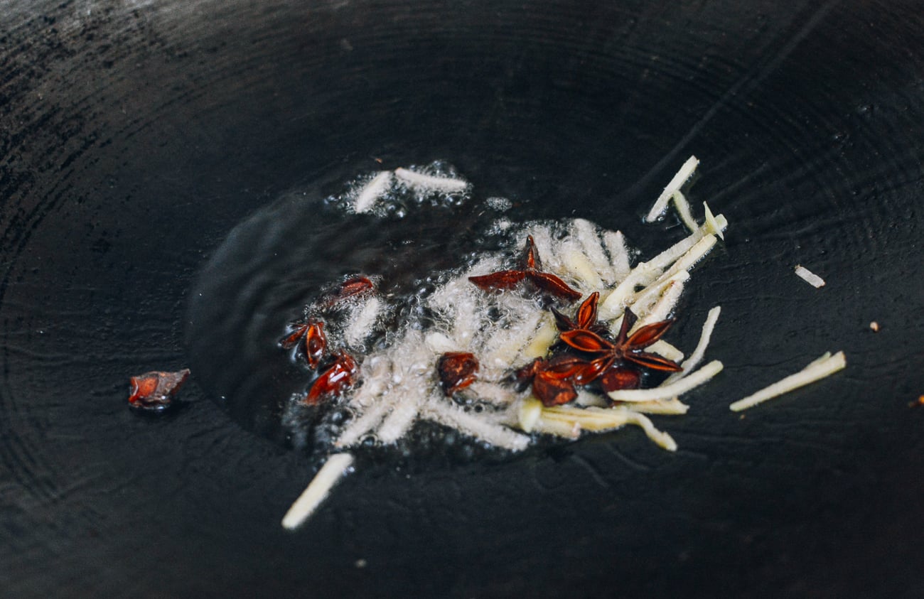 ginger and star anise cooking in oil