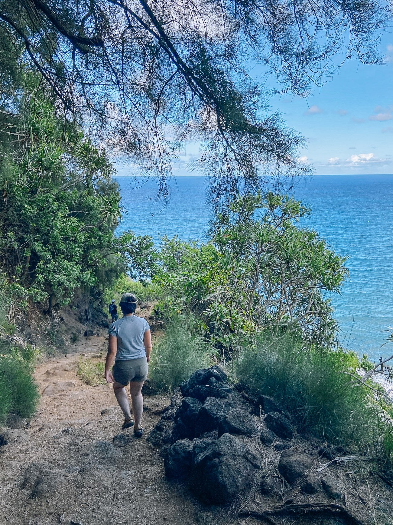 Sarah hiking down to Pololu Valley