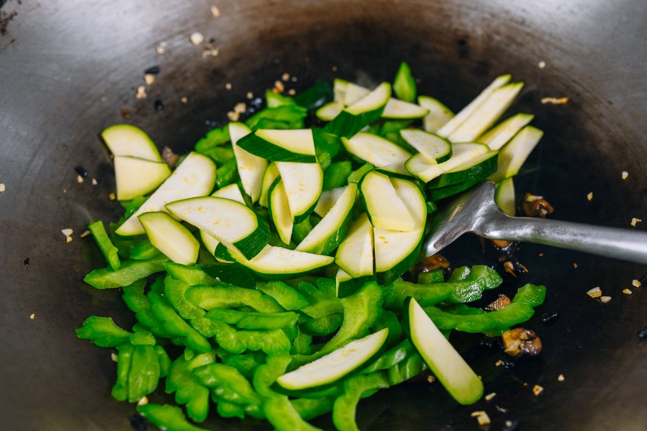 zucchini and bitter melon in wok