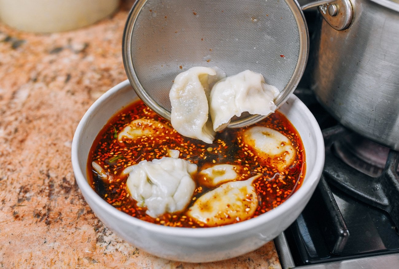 adding dumplings to soup
