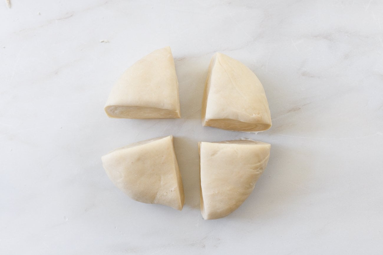 dough ball cut into quarters
