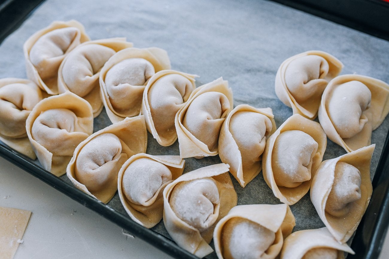 wontons on baking sheet