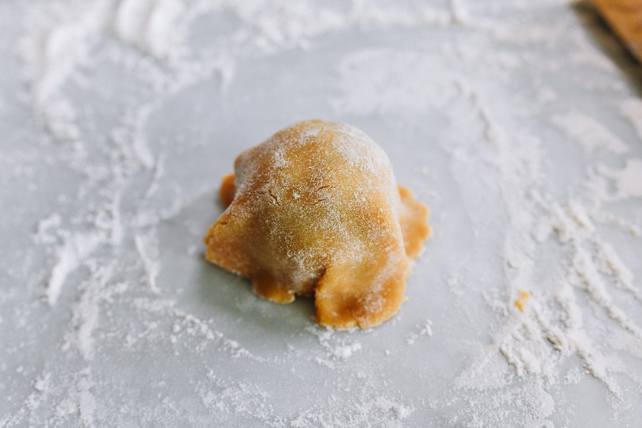 mooncake dough pressed into filling