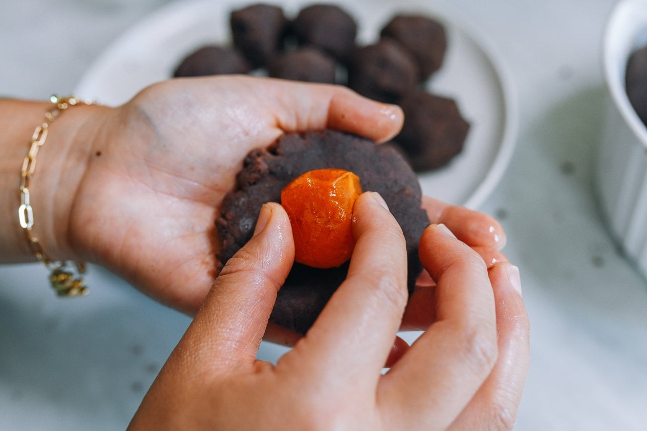 placing egg yolk on disc of red bean paste