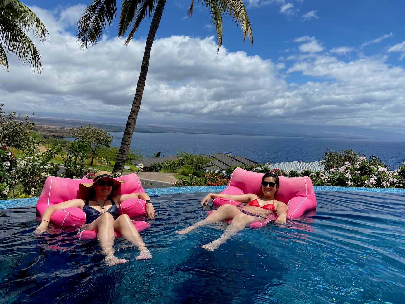 staci and sarah relaxing in a pool