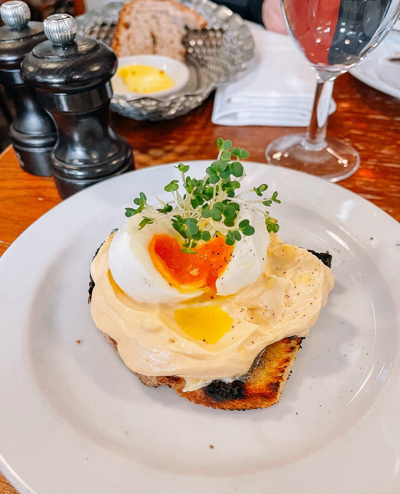 Whipped cod roe mousse topped with a soft boiled egg on toast