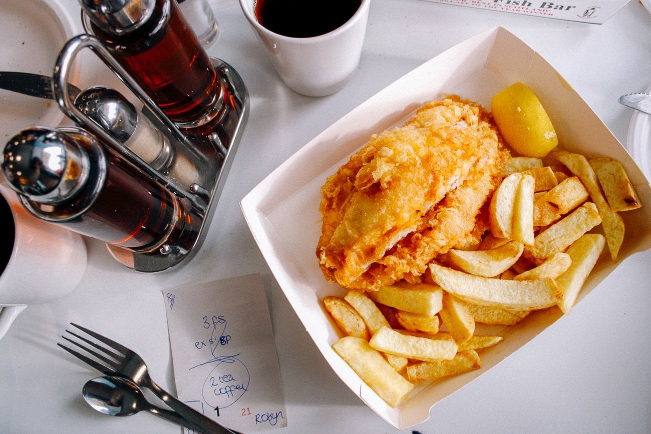 Anstruther's Fish Bar fish and chips with vinegar, tea, and handwritten bill