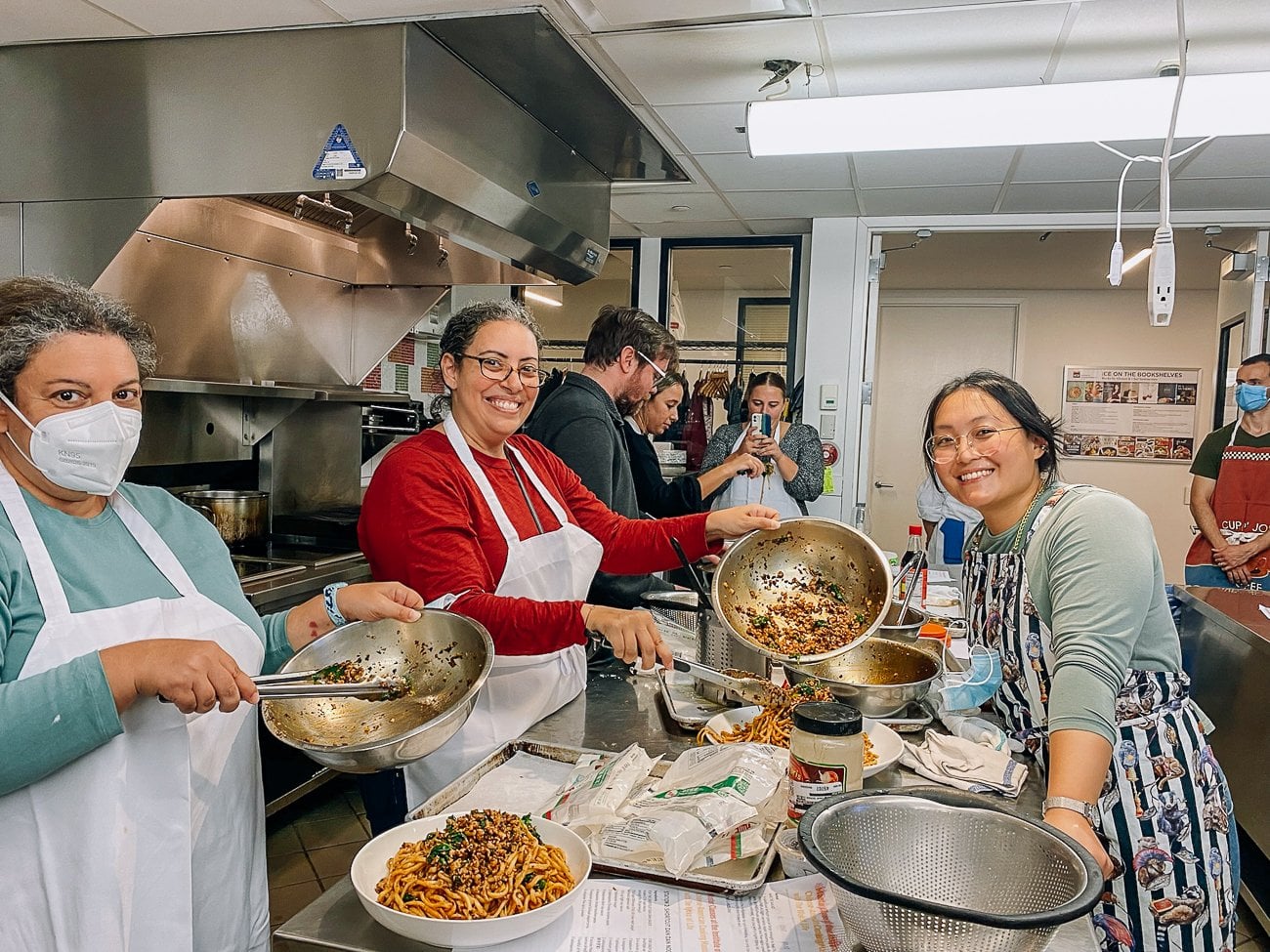 Kaitlin and her group preparing Dan Dan Noodles