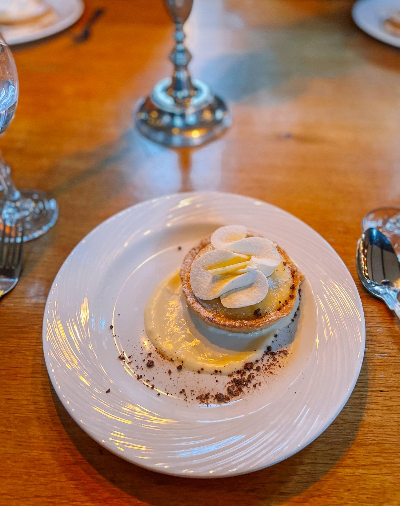 Lemon tart dessert with whipped cream