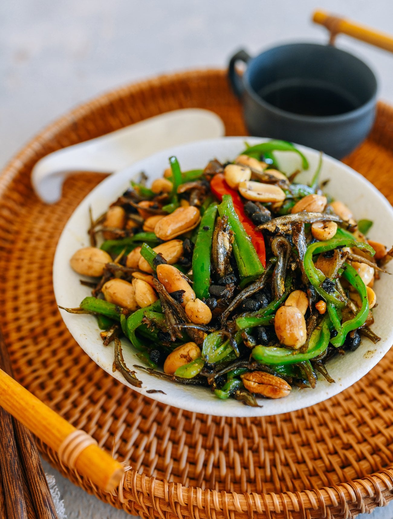 Stir-fried peanuts and anchovies with black bean and peppers