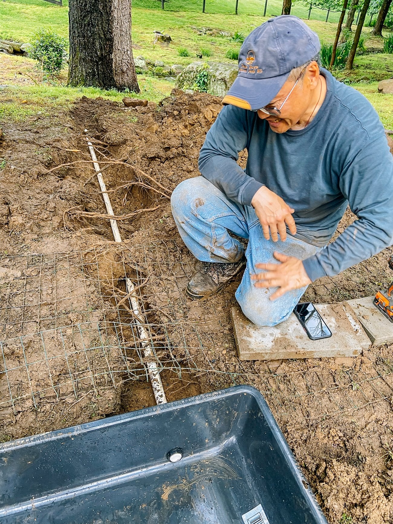 bill with mini duck pond and pvc drain pipe