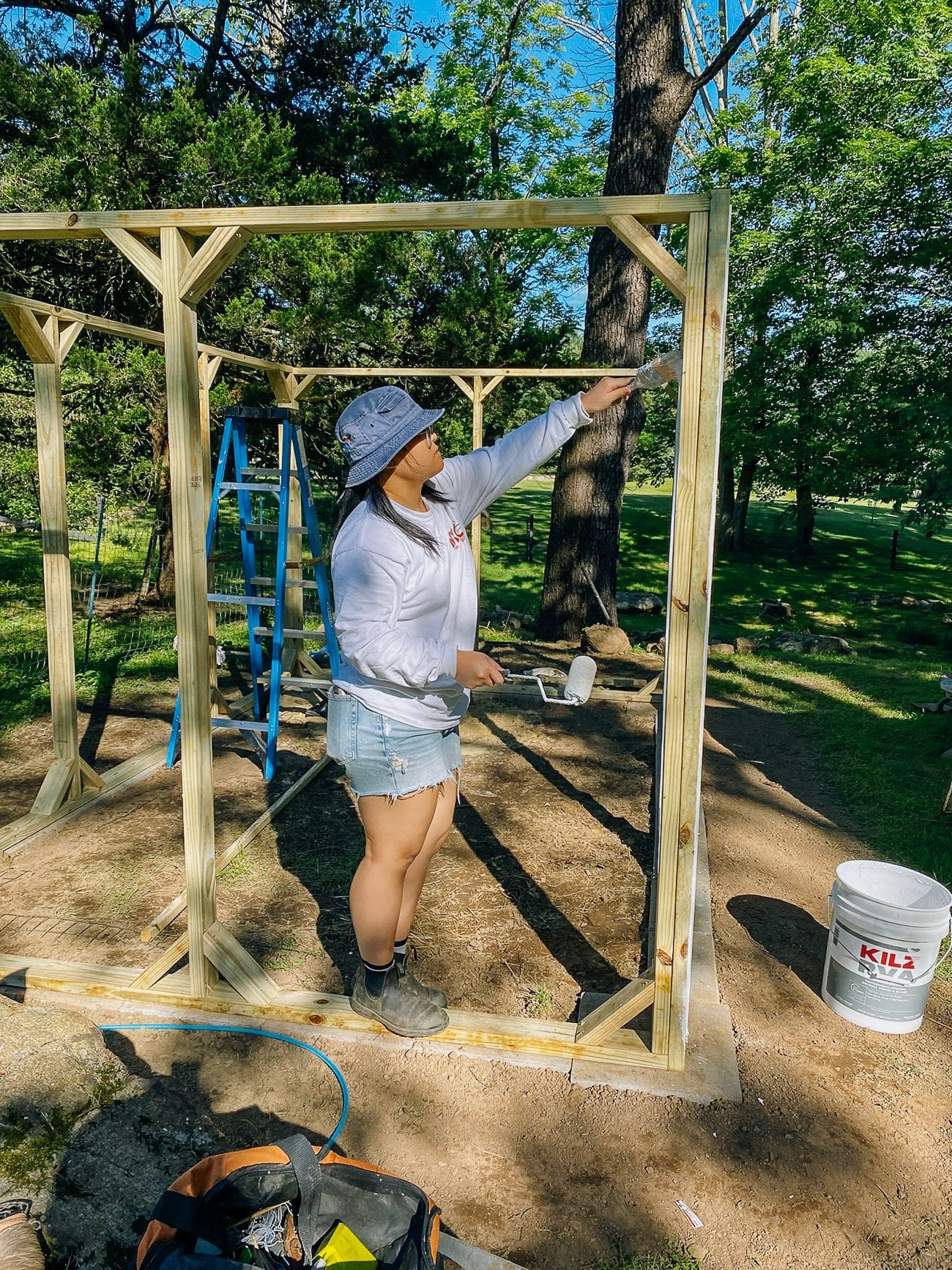 Kaitlin painting the duck run
