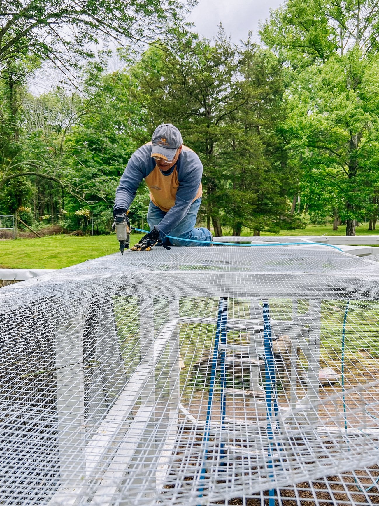 stapling hardware cloth onto duck run