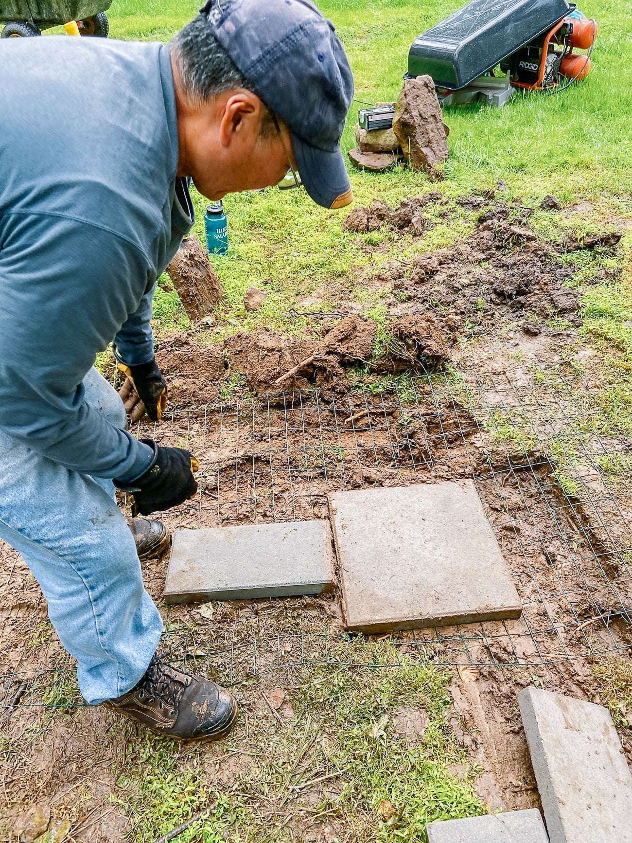 putting down cement blocks for duck run
