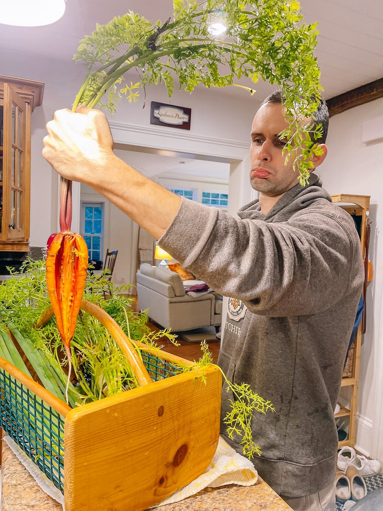 justin holding up hollow carrot