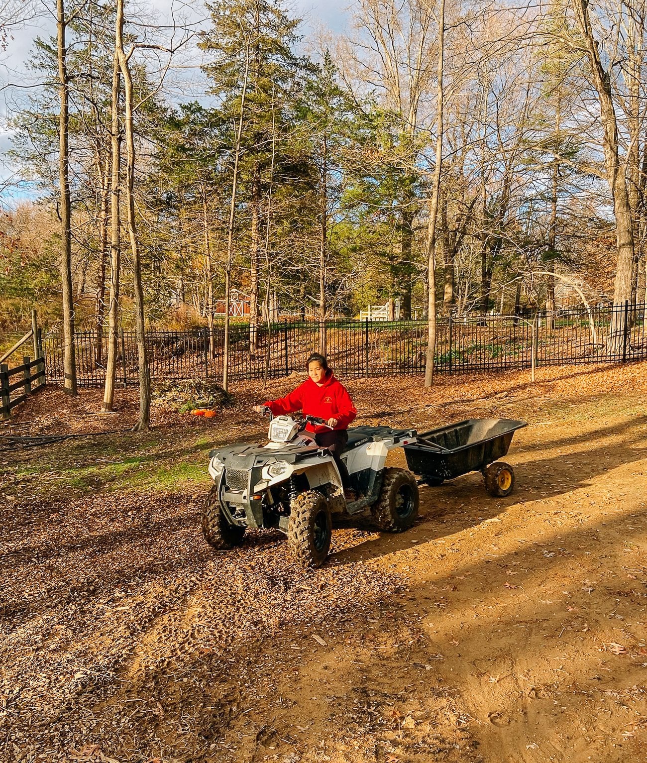 Sarah on four wheeler with trailer