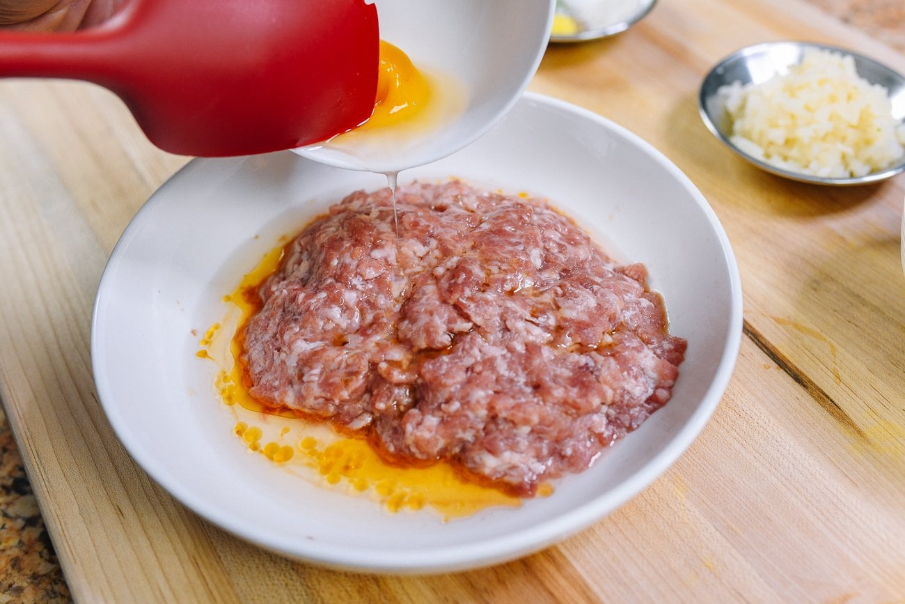 adding salted duck egg white to ground prok