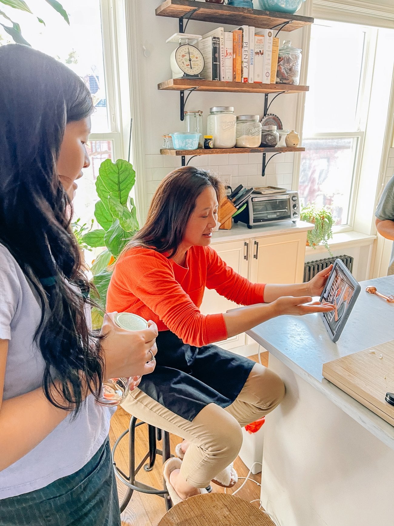 Judy reviewing photos during a cookbook lifestyle shoot