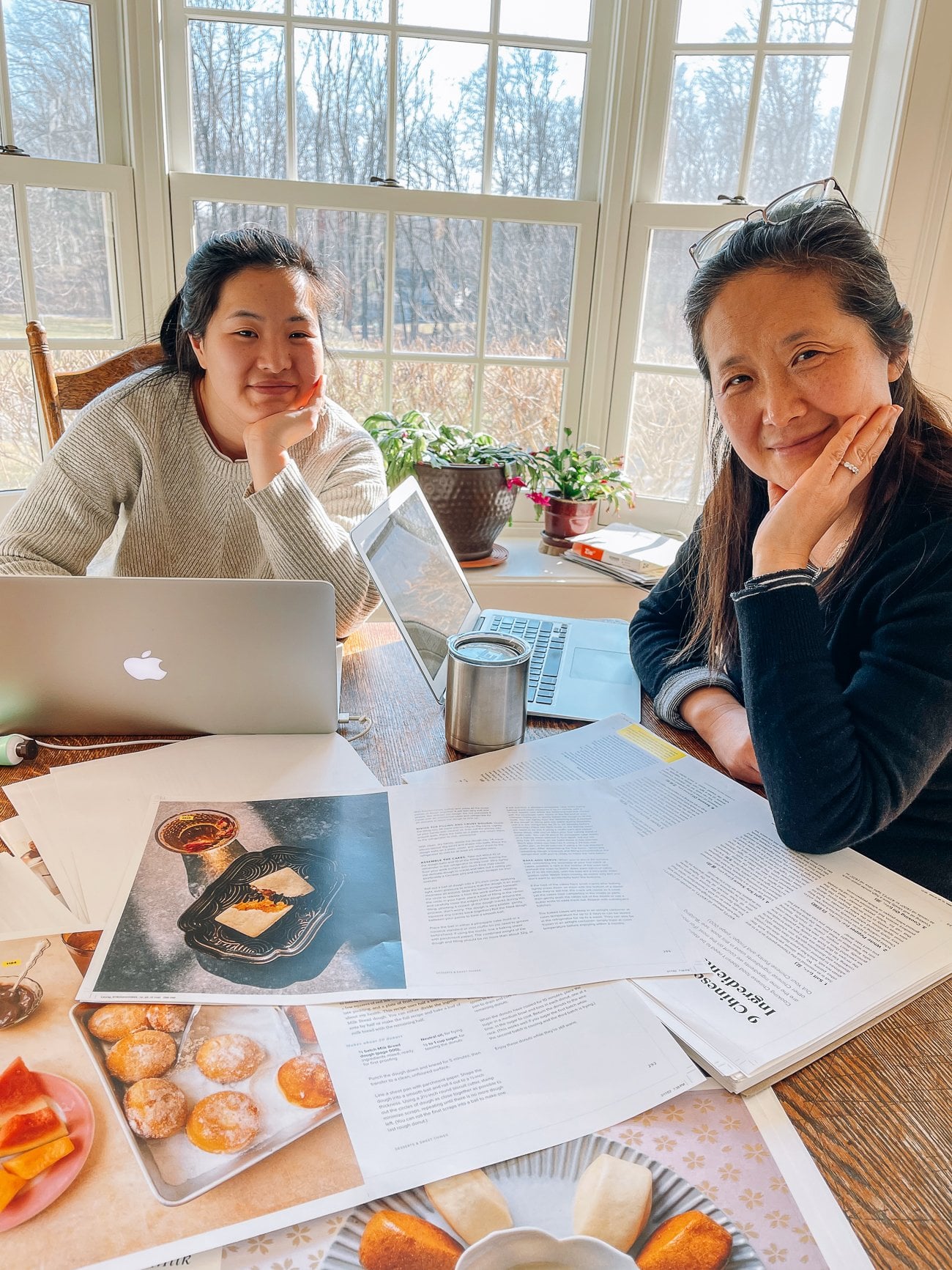 sarah and Judy reviewing cookbook layouts