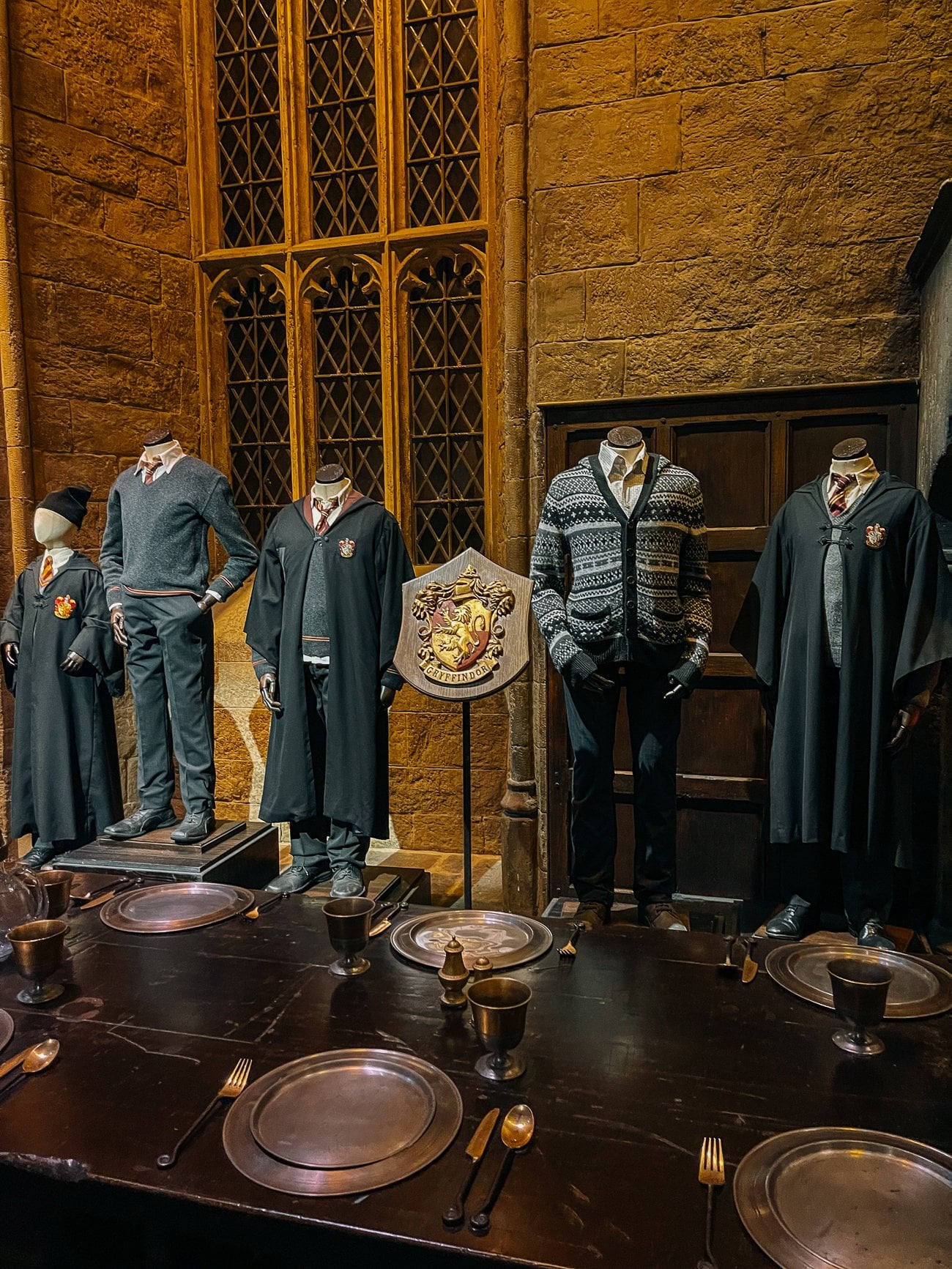 Great Hall at at Harry Potter studio tour with student costume mannequins
