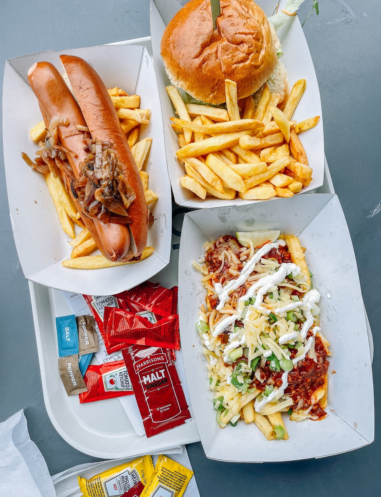 Harry Potter studio tour lunch: hot dog, burger, and chili fries