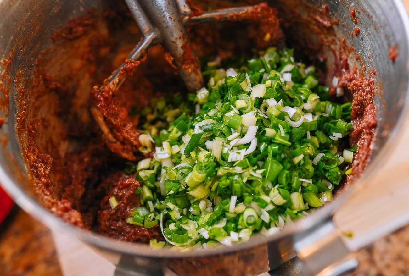 scallions added to beef dumpling filling mixture