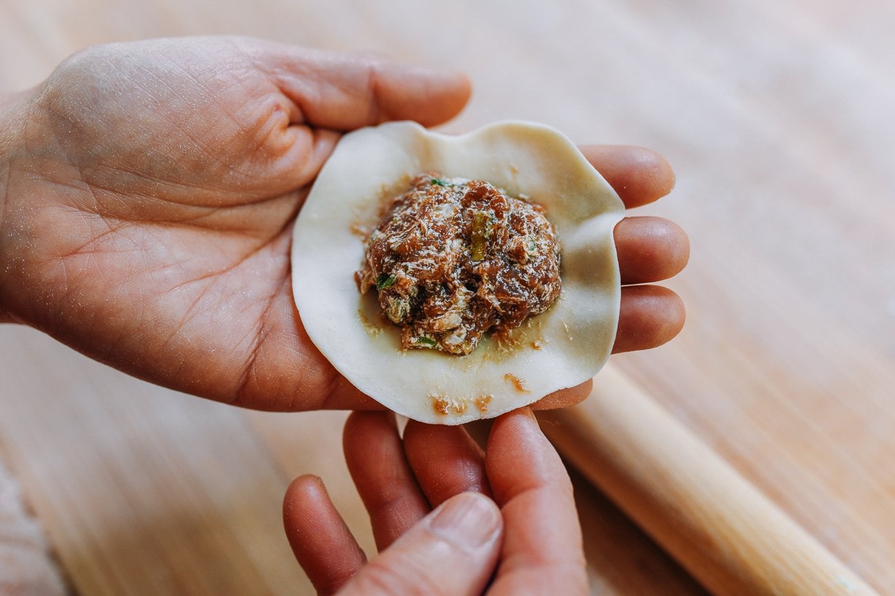 beef dumpling filling in middle of wrapper