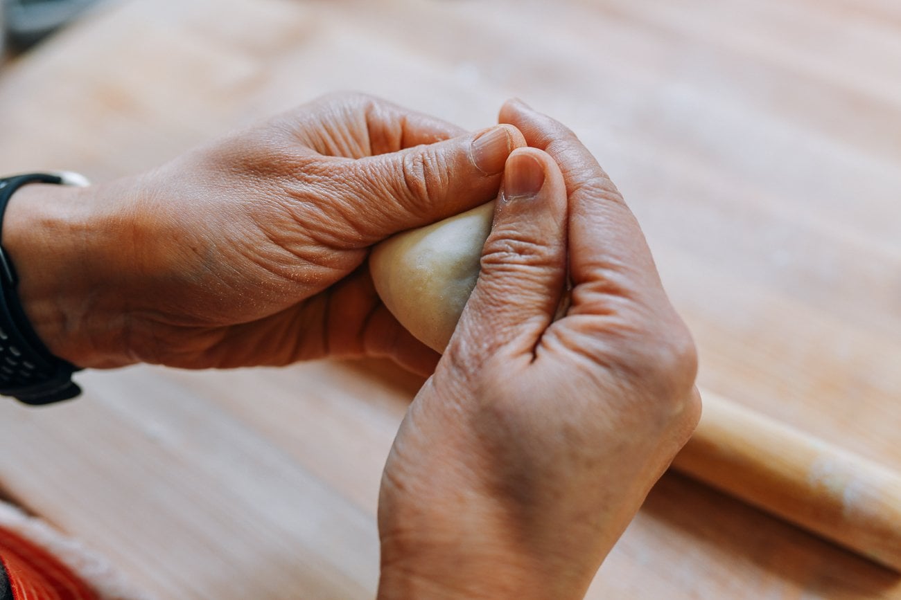 squeezing Chinese dumpling closed