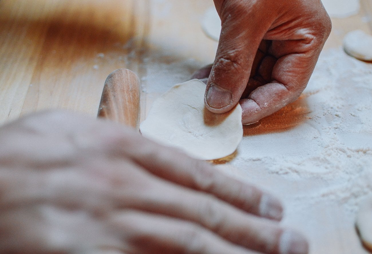 hand rolling dumpling wrapper