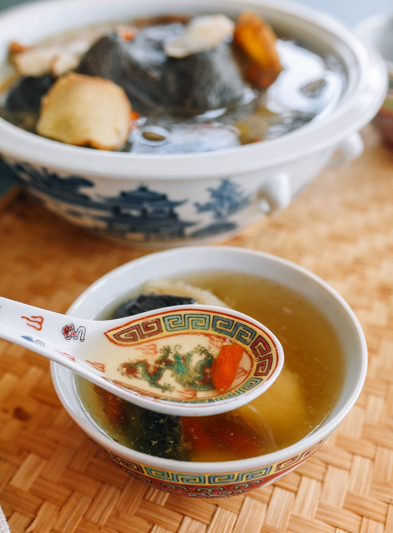 bowl of black chicken soup broth