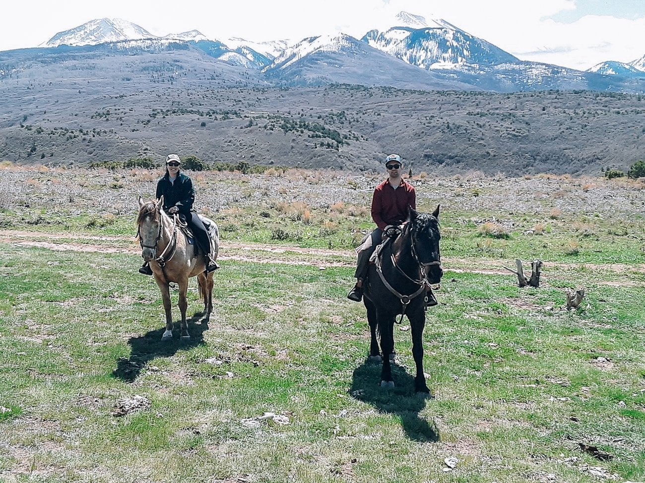 Sarah and Justin horseback riding in Utah