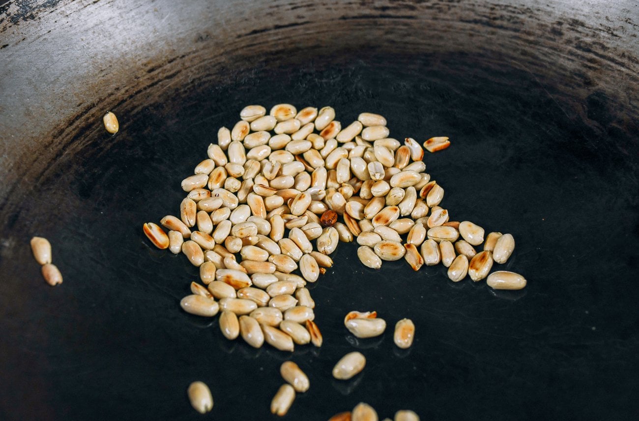 wok roasting peanuts
