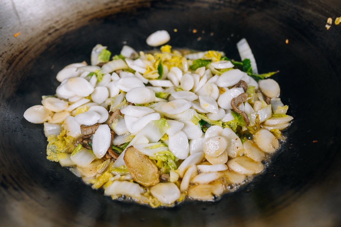 cooking rice cakes in wok