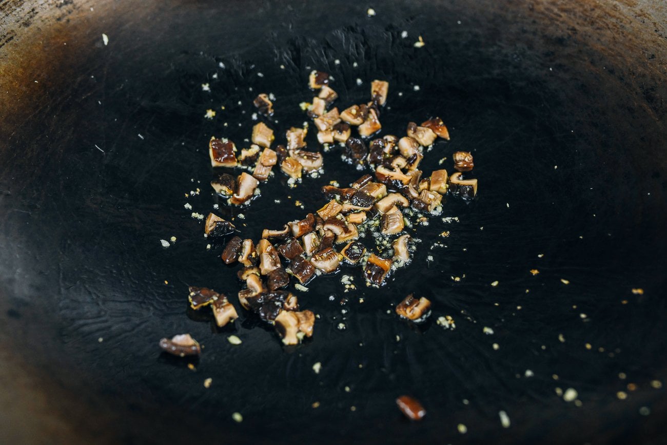 Wok with sizzling shiitake mushrooms