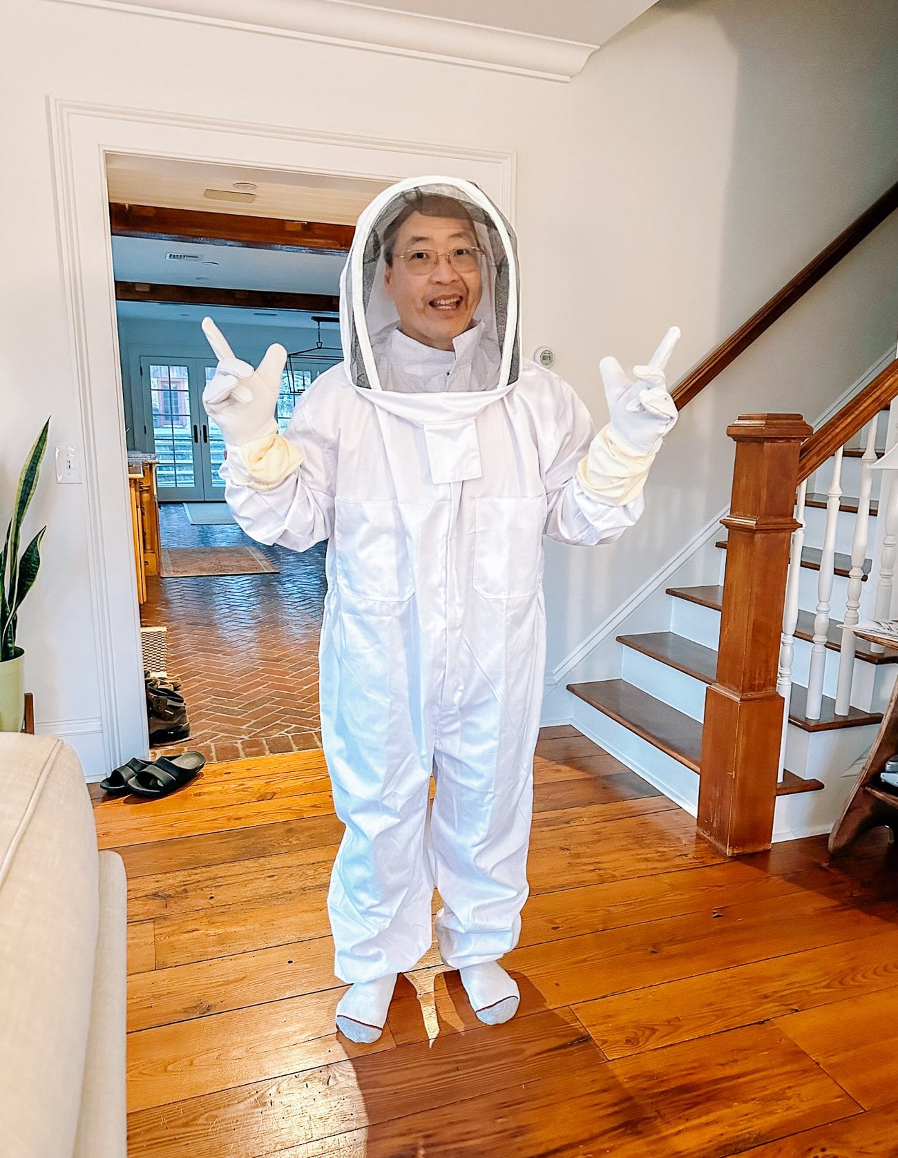 Bill in beekeper suit