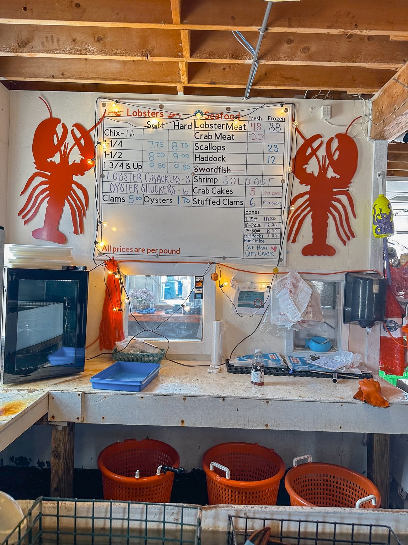 Price list at Atlantic Edge seafood in Boothbay Harbor