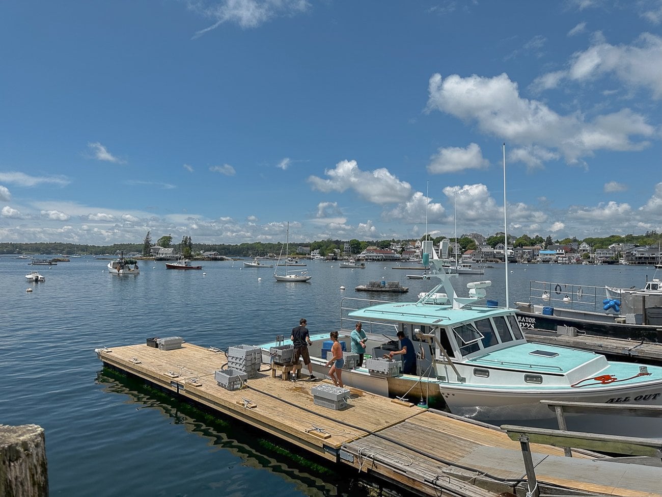 A lobster boat at the dock unpacking their catch