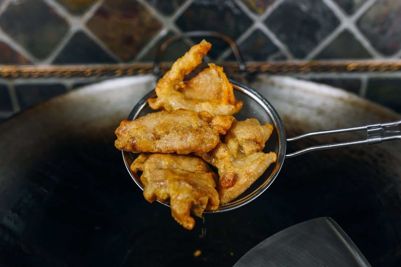 boneless chicken thigh pieces after first fry
