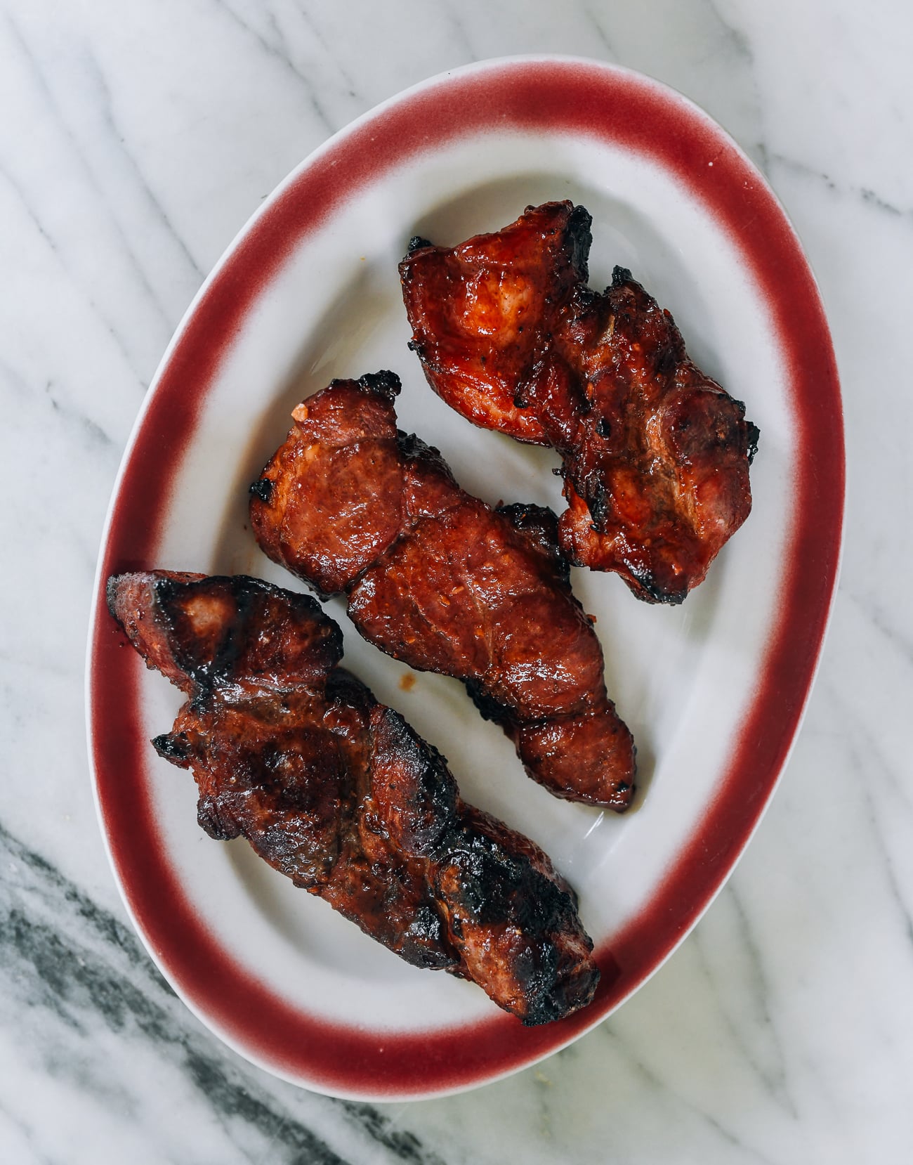 air fryer char siu pieces on plate