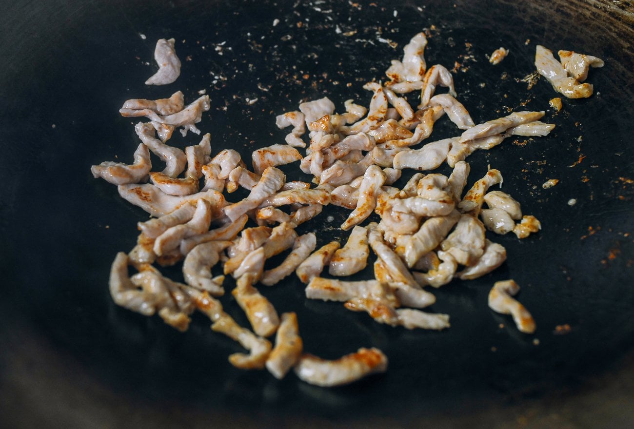 seared chicken in wok