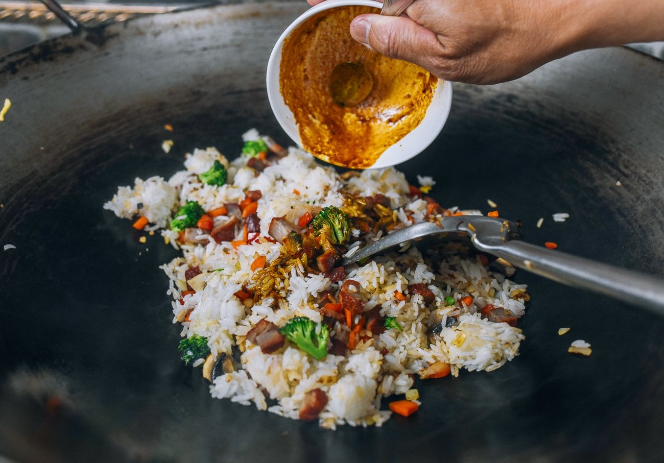 adding seasoning to rice