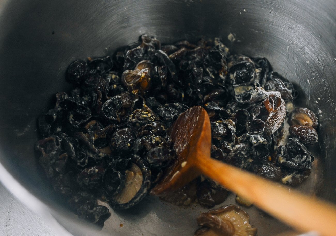 making mushroom noodle soup base