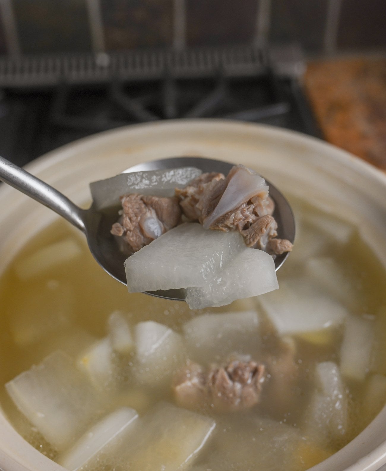 Ladle full of winter melon pork rib soup