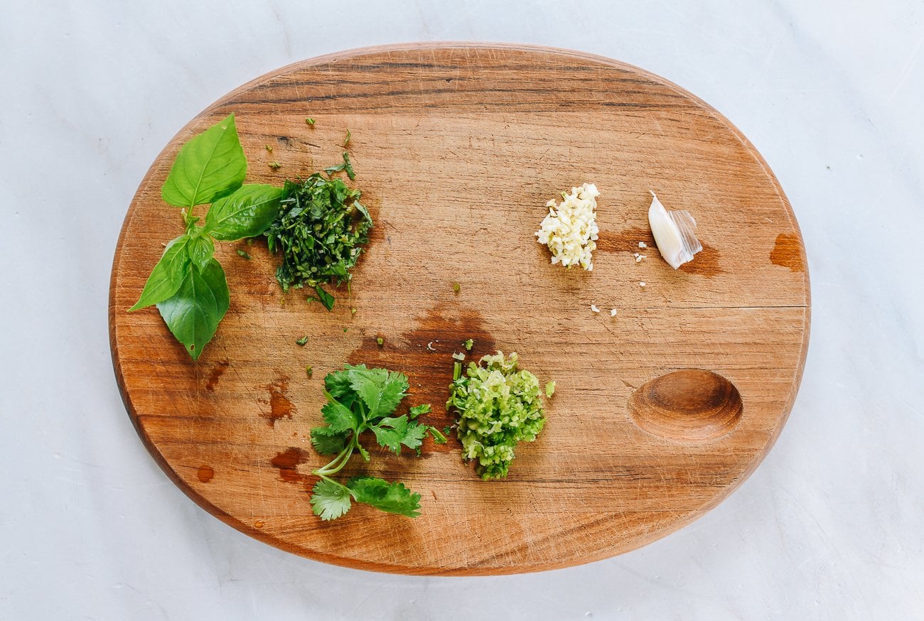 minced herbs on cutting board