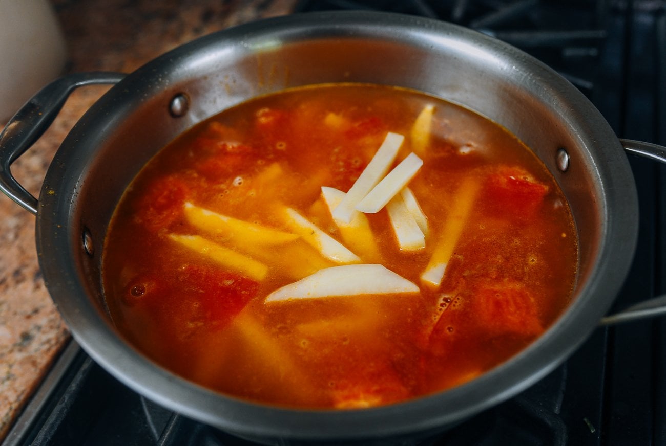 Making summer tomato potato soup
