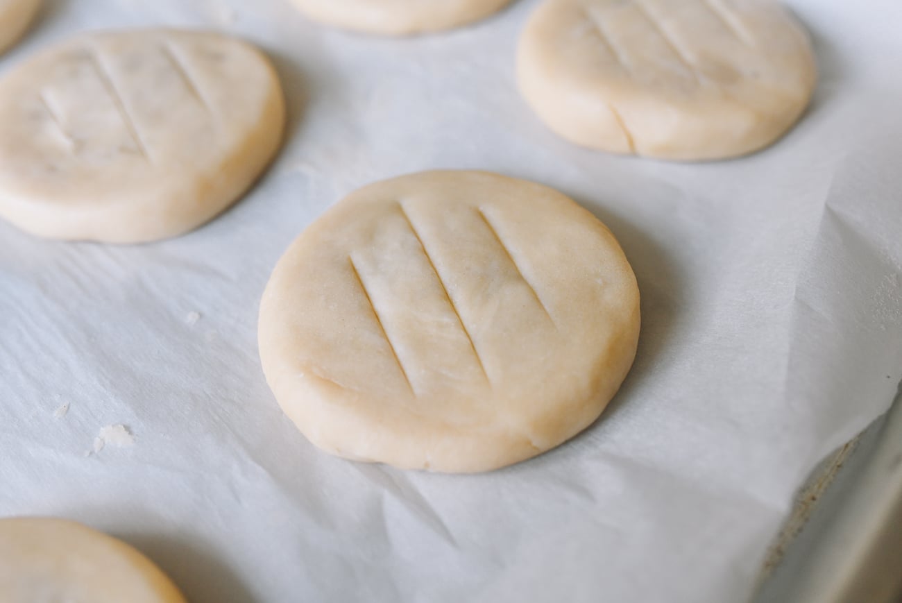 Three slashes cut into wife cake before baking