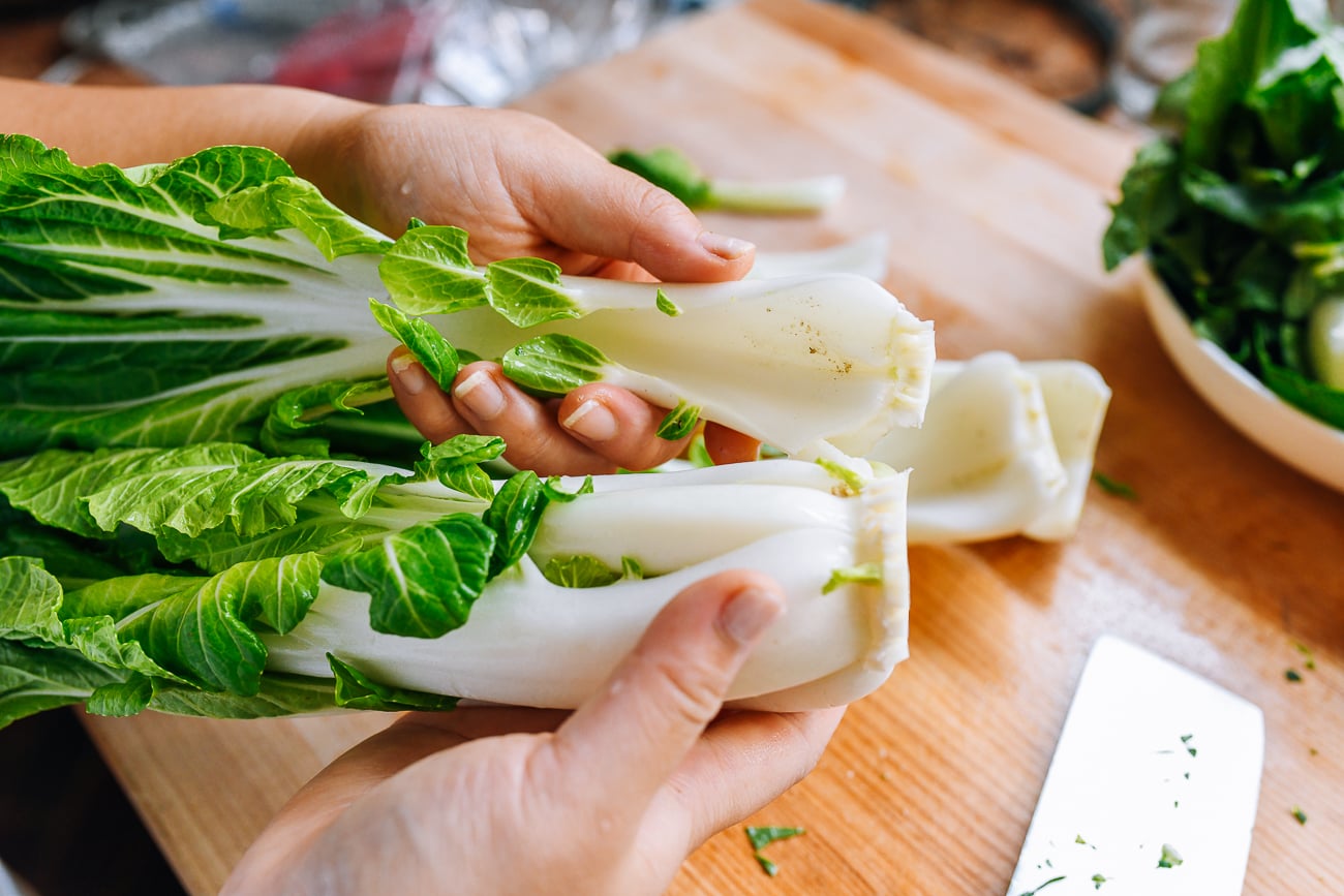 separating leaves of large bok choy