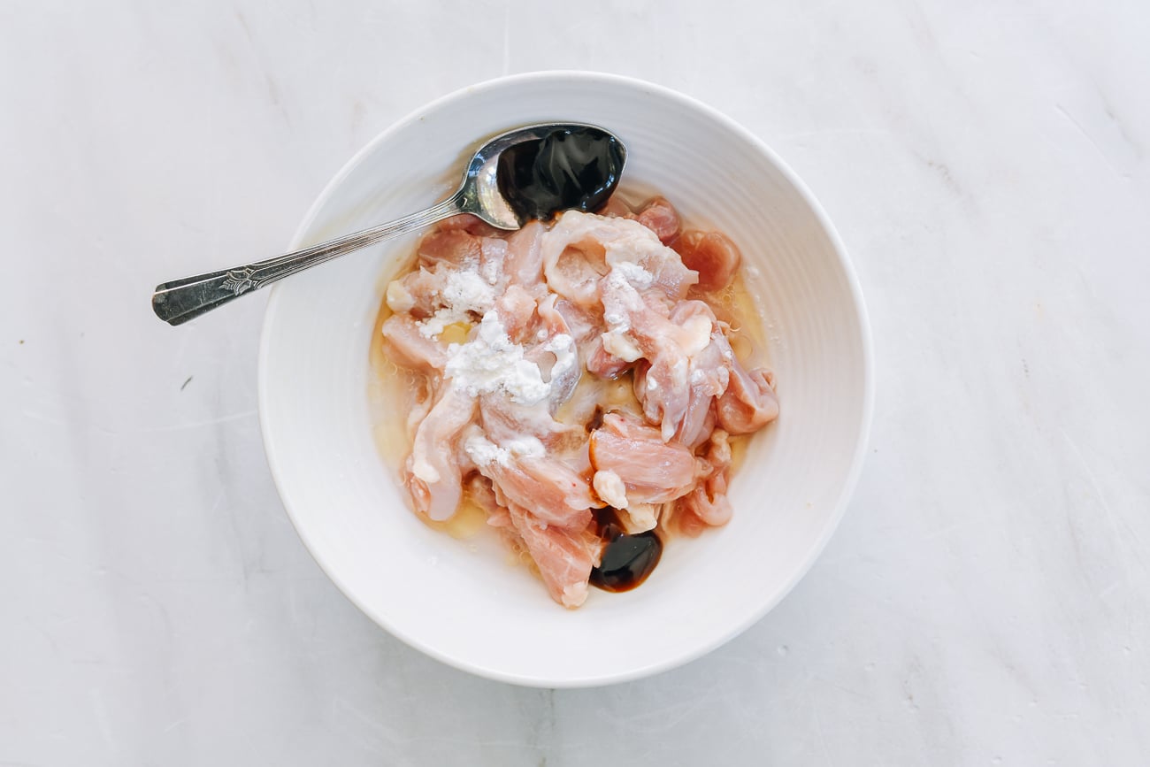 sliced chicken thighs with marinade ingredients