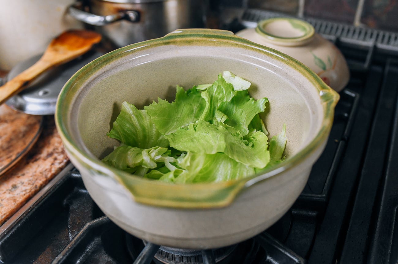 iceberg lettuce in clay pot